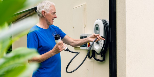 Man using his EV charger