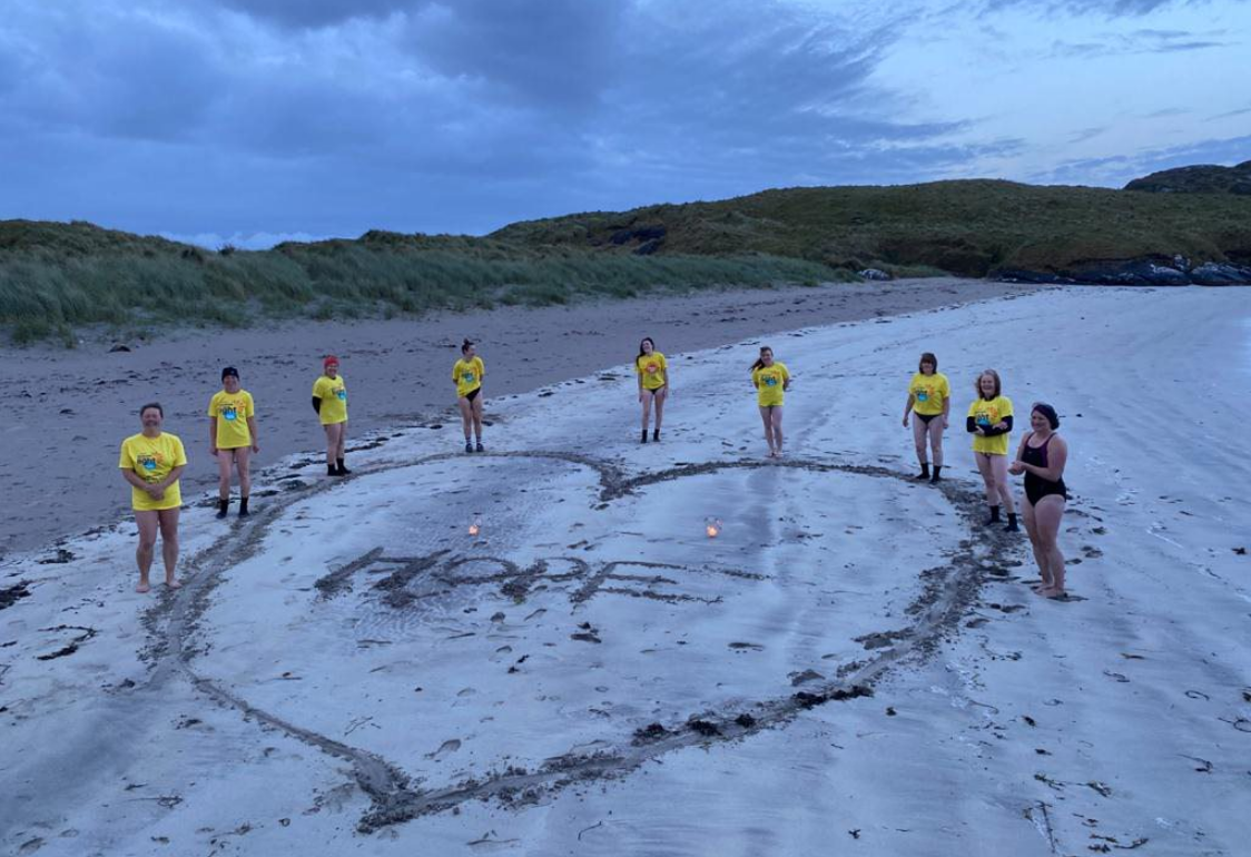 Thousands brave the weather to unite under 'One Sunrise Together' for Darkness Into Light 2021